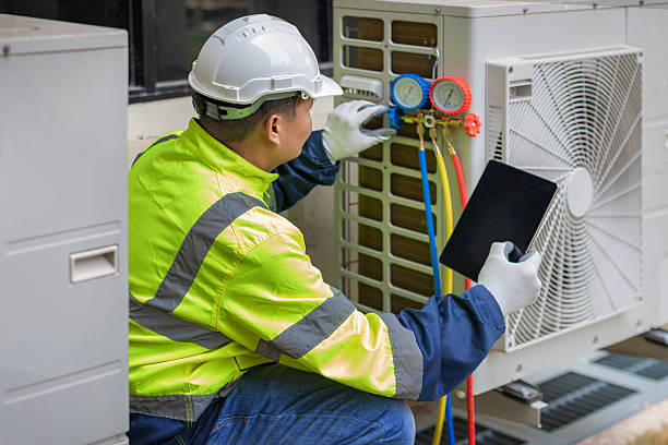 Professional Air Conditioning Repair technician working in Mattapoisett, MA